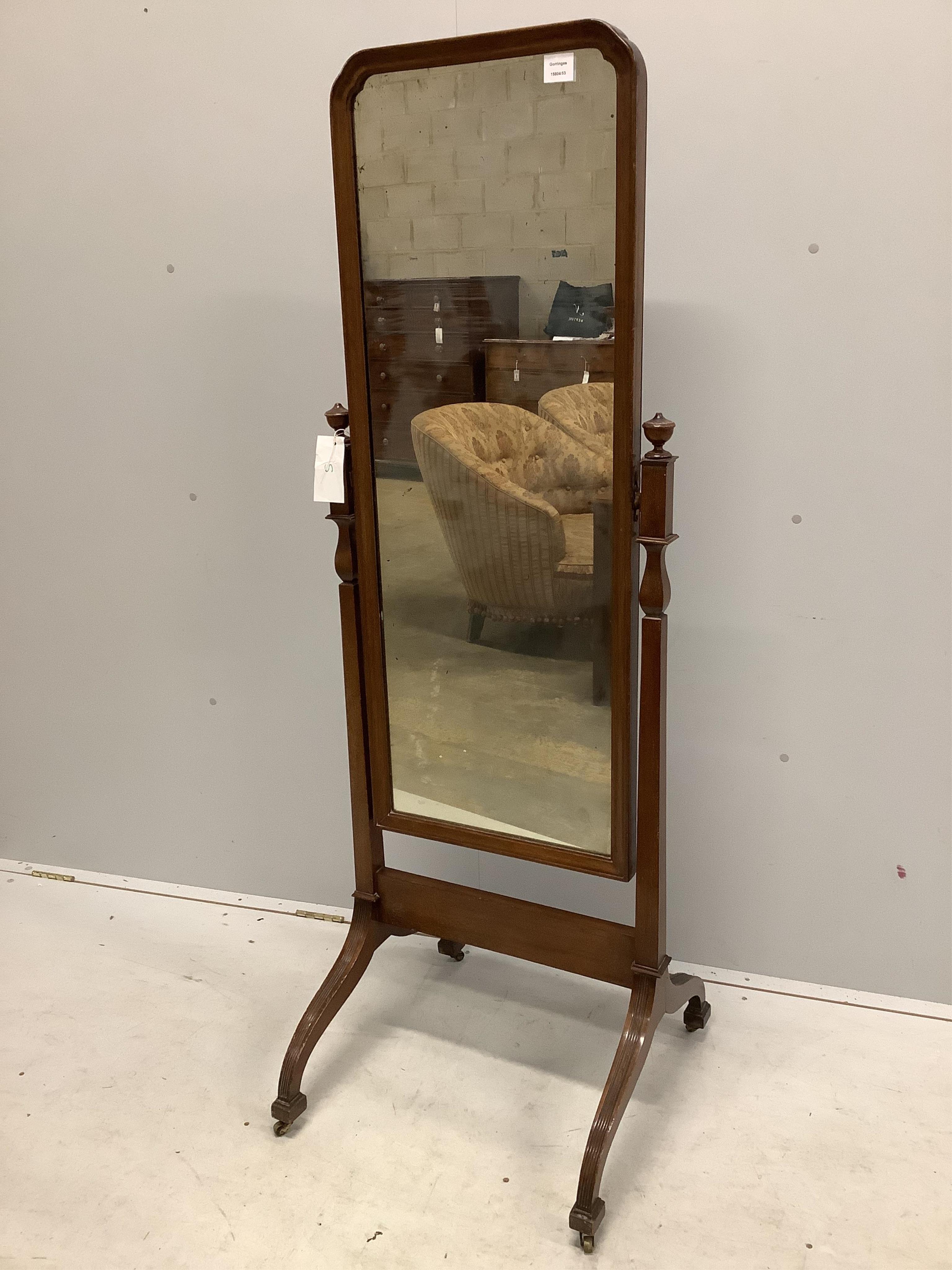 An early 20th century mahogany cheval mirror with moulded frame and reeded down swept legs, width 54cm, height 159cm. Condition - fair